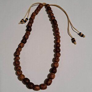 wooden beaded necklace with a pull string closure